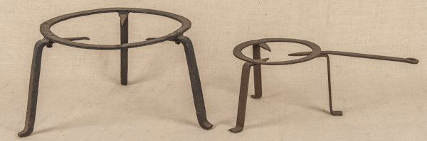 Two wrought iron trivets, 19th c., largest - 8 1/: Two wrought iron trivets, 19th c., largest - 8 1/4'' h., 14'' dia.