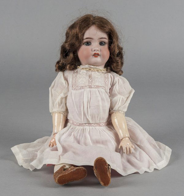 C. M. Bergman Simon & Halbig bisque head doll, 19: C. M. Bergman Simon & Halbig bisque head doll, 19th c., with a jointed composition body, 20'' h.