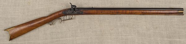 Smooth bore percussion boy's rifle, approximately: Smooth bore percussion boy's rifle, approximately .45 caliber, with tiger maple full stock, a brass nose cap, a trigger guard, and a butt plate, 23'' octagonal barrel, together with a W. Richards Brit