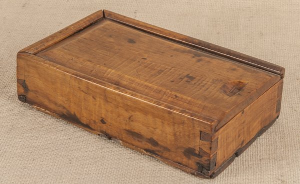 Tiger maple candlebox, 19th c., 2 1/4'' h., 9'' w.,: Tiger maple candlebox, 19th c., 2 1/4'' h., 9'' w., 5 1/2'' d.