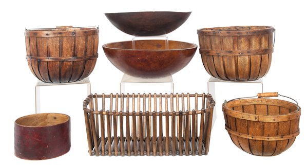 Two turned wood bowls, together with three swing: Two turned wood bowls, together with three swing handle baskets, a bentwood pantry box, and a spindle basket.