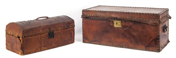 Two leather covered boxes, 19th c., with brass ta: Two leather covered boxes, 19th c., with brass tack decoration, 10 3/4'' h., 24'' w. and 9'' h., 18'' w.