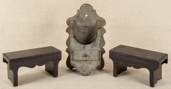 Pair of stained mahogany footstools, late 19th c.: Pair of stained mahogany footstools, late 19th c., 5 1/2'' h., 10 1/2'' w., together with a painted mortar and pestle rack, 14'' h., 8 1/2'' w. Provenance: Country Treasures; G. Meekins; Raccoon Creek