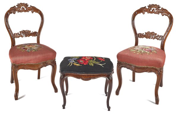 Pair of Victorian carved mahogany side chairs, to: Pair of Victorian carved mahogany side chairs, together with a French footstool.