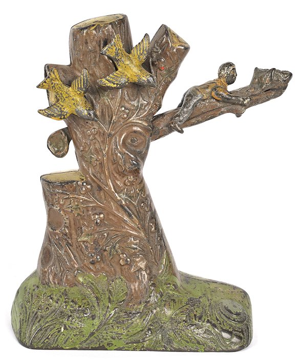 Cast iron Boy Robbing Bird's Nest mechanical bank: Cast iron Boy Robbing Bird's Nest mechanical bank manufactured by J. & E. Stevens Company.