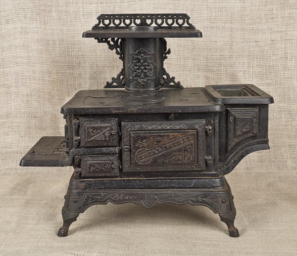 Mt. Penn Stove Works cast iron child's stove, 1: Mt. Penn Stove Works cast iron child's stove, 16'' h., 18'' w.