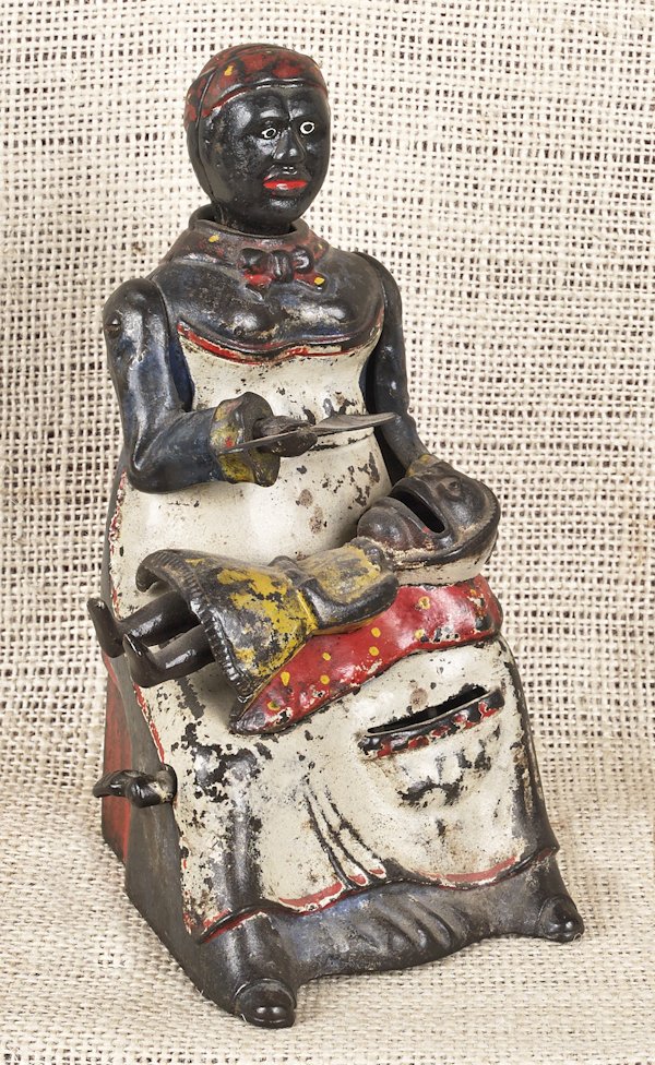 Cast iron Mammy and Child mechanical bank manufac: Cast iron Mammy and Child mechanical bank manufactured by Kyser & Rex.