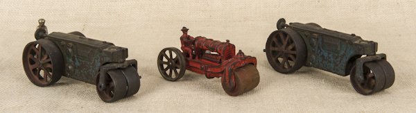 Two Arcade cast iron road rollers, 7 3/4'' l., tog: Two Arcade cast iron road rollers, 7 3/4'' l., together with another cast iron road roller, 5 1/2'' l.