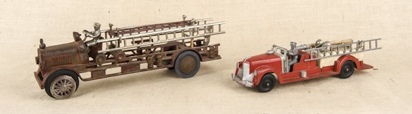 Two Hubley cast iron ladder trucks, 13 1/2'' l. an: Two Hubley cast iron ladder trucks, 13 1/2'' l. and 17'' l.