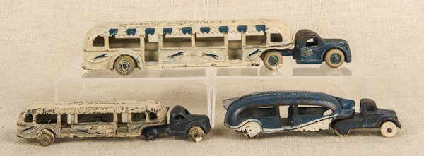 Three Arcade cast iron Greyhound Lines buses, 1: Three Arcade cast iron Greyhound Lines buses, 11 1/2'' l., 7 1/2'' l., and 6 3/4'' l.