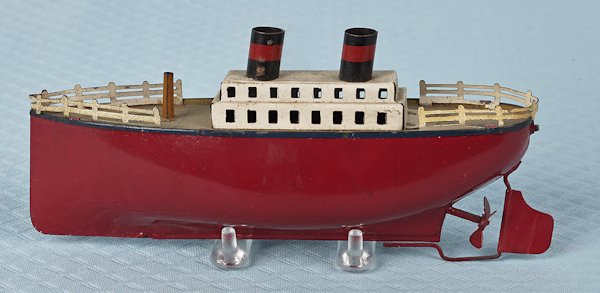Tin clockwork ocean liner, 8 1/2'' l.: Tin clockwork ocean liner, 8 1/2'' l.
