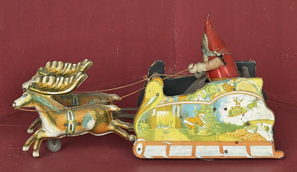 Strauss tin wind-up Santee Claus toy, 11 1/4'' l.: Strauss tin wind-up Santee Claus toy, 11 1/4'' l.