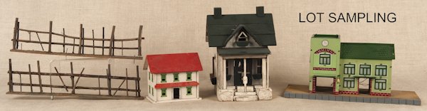 Tin train layout fire station, 16'' w., together w: Tin train layout fire station, 16'' w., together with a wood house with tin window frames, a contemporary painted wood house, and several sections of twig fence.