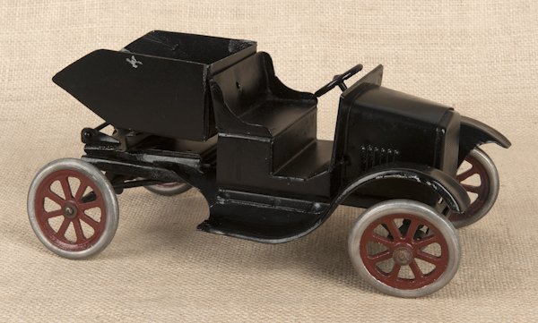 Buddy L pressed steel Flivver dump car, 12 1/2'' l: Buddy L pressed steel Flivver dump car, 12 1/2'' l.