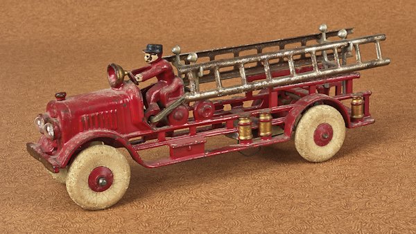 Hubley cast iron ladder truck with electric headl: Hubley cast iron ladder truck with electric headlights, 12'' l.