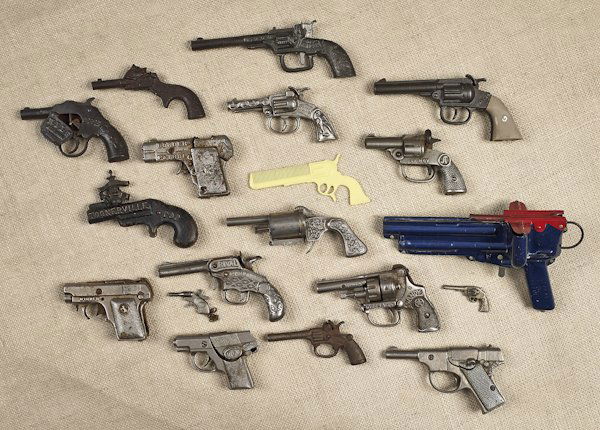 Collection of nineteen cast iron and nickel cap g: Collection of nineteen cast iron and nickel cap guns.