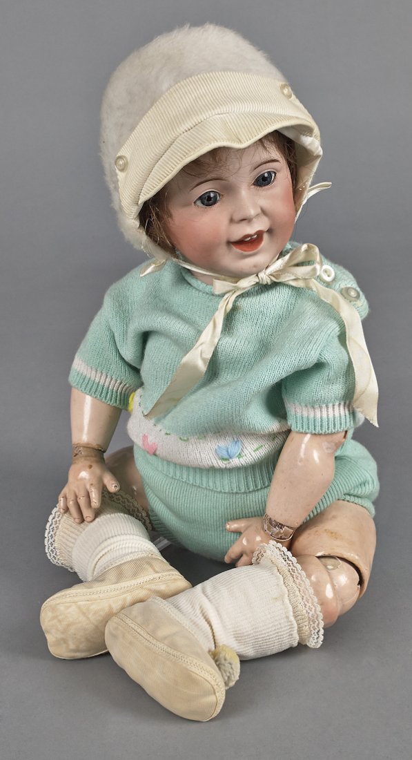 French Jumeau bisque head laughing doll, inscribe: French Jumeau bisque head laughing doll, inscribed S.F.B.J. 236 Paris 10, with fixed eyes, a closed mouth, and a jointed composition body, 20'' h.