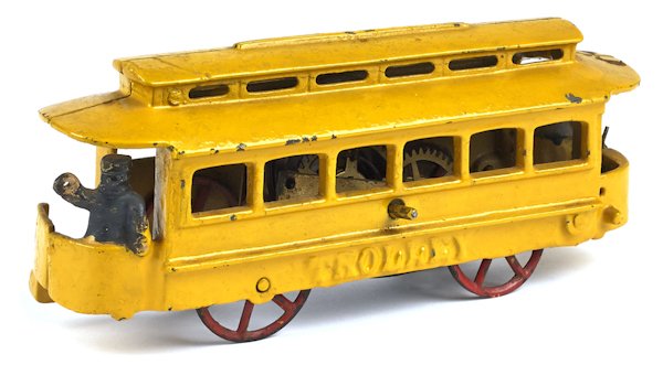 Cast iron wind-up Trolley car, 7 3/4'' l.: Cast iron wind-up Trolley car, 7 3/4'' l.