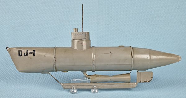 Homemade pressed steel and wood submarine model,: Homemade pressed steel and wood submarine model, 18 3/4'' l.