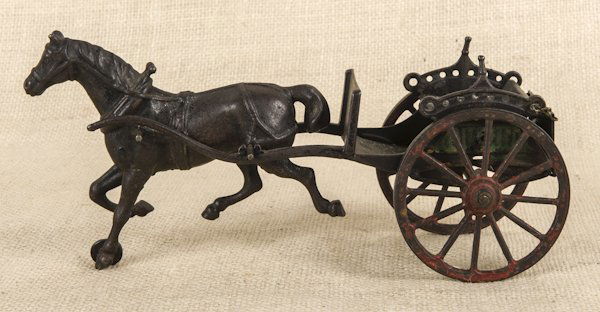 Cast iron horse drawn cart, 10'' l.: Cast iron horse drawn cart, 10'' l.