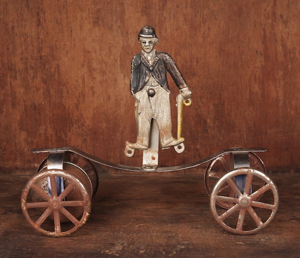 Watrous Charlie Chaplin bell toy, 6 3/4'' l.: Watrous Charlie Chaplin bell toy, 6 3/4'' l.