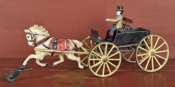 Pratt and Letchworth cast iron horse drawn cart,: Pratt and Letchworth cast iron horse drawn cart, 16'' l.