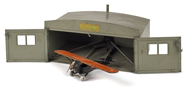 Buddy L pressed steel Catapult Airplane and han: Buddy L pressed steel Catapult Airplane and hanger, 6'' h., 12'' w.