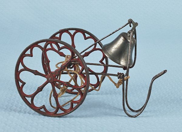 Cast iron bell toy manufactured by the Gong Bell: Cast iron bell toy manufactured by the Gong Bell Company, 7 3/4'' l.