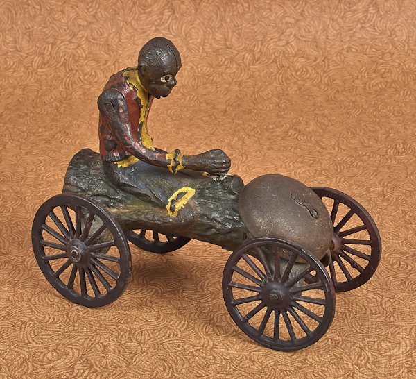 N. N. Hill Brass Co. cast iron monkey on a log be: N. N. Hill Brass Co. cast iron monkey on a log bell toy, 6 1/4'' l.