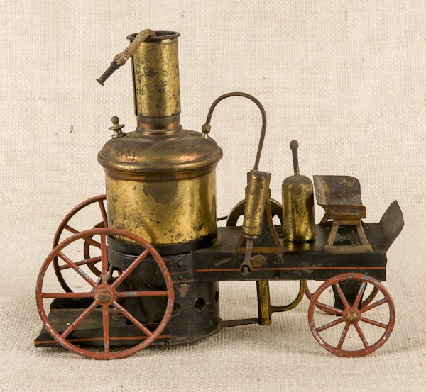 Schoenner tin live steam fire pumper, 9 1/4'' l.: Schoenner tin live steam fire pumper, 9 1/4'' l.