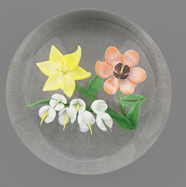 Randall Grubb floral paperweight with white, yell: Randall Grubb floral paperweight with white, yellow, and orange blossoms, signed and dated '86, 3'' dia.