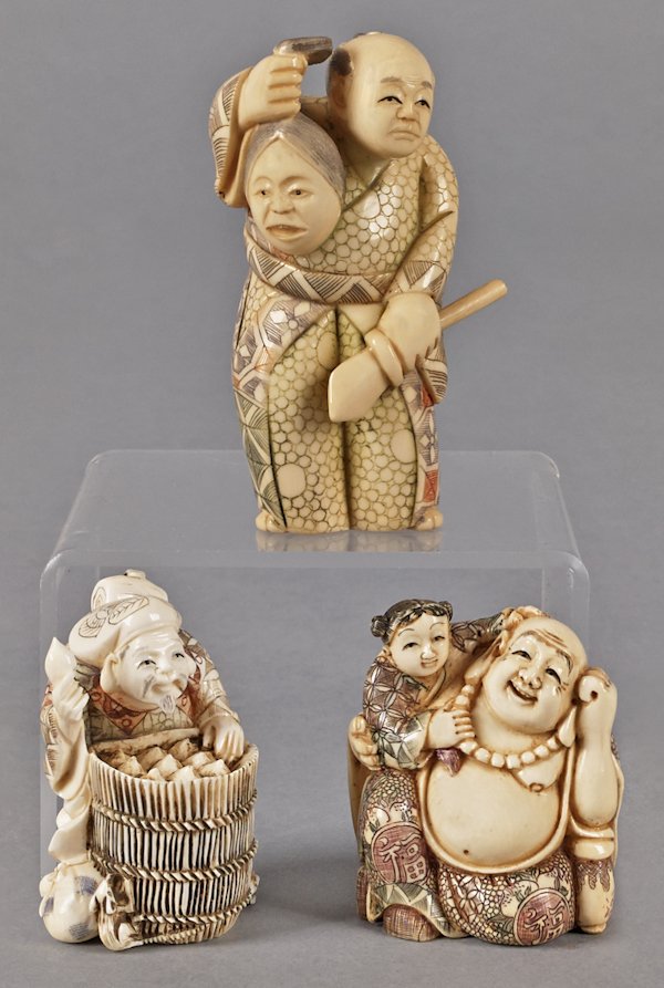 Three Japanese carved ivory netsuke with ink deco: Three Japanese carved ivory netsuke with ink decoration, tallest - 3''.