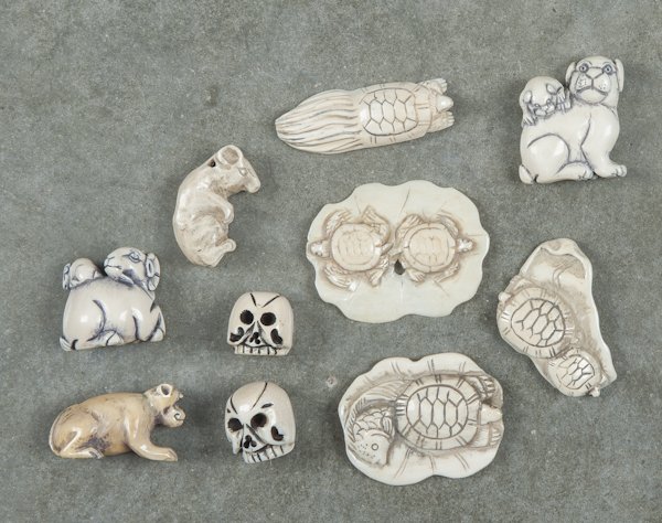Ten Japanese carved ivory netsuke.: Ten Japanese carved ivory netsuke.