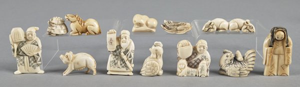 Twelve Japanese carved ivory netsuke.: Twelve Japanese carved ivory netsuke.