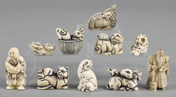 Ten Japanese carved ivory netsuke.: Ten Japanese carved ivory netsuke.