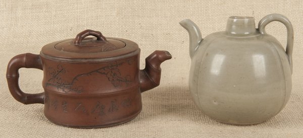 Chinese Yixing teapot, 3 1/2'' h., together with a: Chinese Yixing teapot, 3 1/2'' h., together with a Yaozhou clay teapot, 4 1/4'' h.