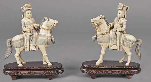 Pair of Chinese carved ivory figures on horseback: Pair of Chinese carved ivory figures on horseback, 8'' h.