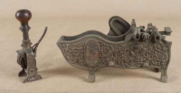 Cast iron package sealer by National Binding Co.,: Cast iron package sealer by National Binding Co., New York, 12 1/2'' l., together with an Excelsior date stamp, 7 1/2'' h.