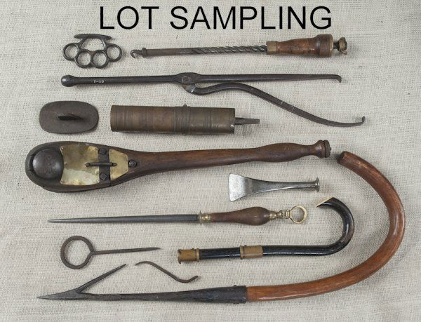 Miscellaneous tools, to include brass and leather: Miscellaneous tools, to include brass and leather bellows, a bulldog log holder, a klaxton, early wrought iron shears, iron knuckles, etc.