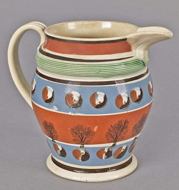 Mocha pitcher, 19th c., with cat's eye and seawee: Mocha pitcher, 19th c., with cat's eye and seaweed decoration, 7 3/4'' h.