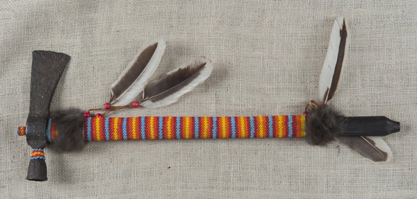Iroquois iron trade axe, re-mounted with a beaded: Iroquois iron trade axe, re-mounted with a beaded handle, 21'' l.