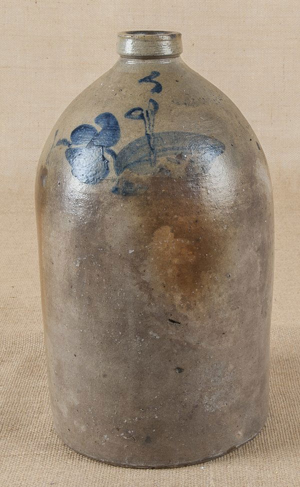 Three pieces of stoneware, 19th c., with cobalt b: Three pieces of stoneware, 19th c., with cobalt blue decoration, the smallest jug impressed Lyons, tallest - 15 3/4'', together with two redware pitchers.