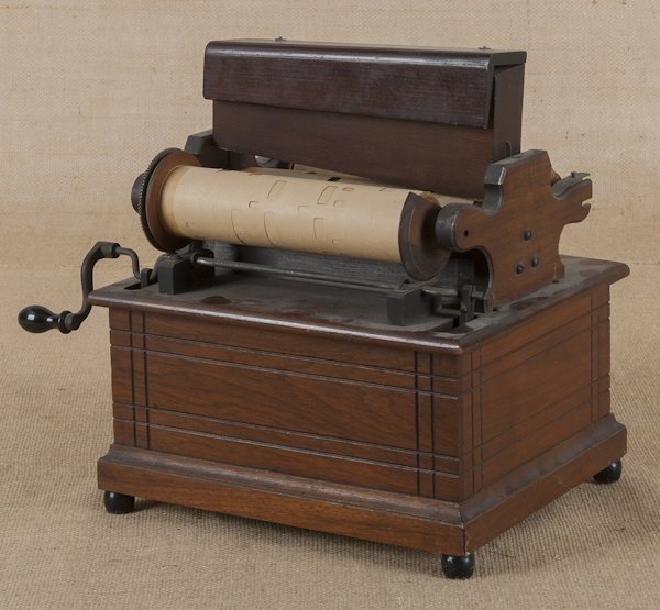 Victorian walnut roller organ, 13 1/2'' h.: Victorian walnut roller organ, 13 1/2'' h.