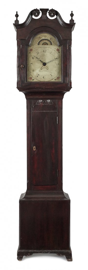 Pennsylvania Chippendale stained poplar tall cas: Pennsylvania Chippendale stained poplar tall case clock, the bonnet with elaborately carved rosettes and plinths, enclosing a thirty-hour works, the face inscribed Peter Miller, 87'' h.