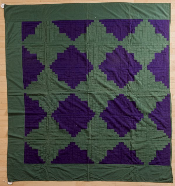 Amish purple and green pieced wool crepe quilt,: Amish purple and green pieced wool crepe quilt, in a log cabin pattern, 74'' x 81''.