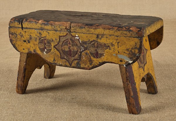 Painted and carved pine footstool, 19th c., 7'' h.: Painted and carved pine footstool, 19th c., 7'' h., 12'' w.