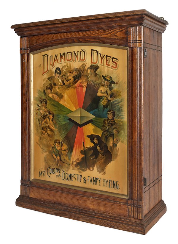 Oak Diamond Dyes cabinet, 19th c., with the lif: Oak Diamond Dyes cabinet, 19th c., with the life cycle of a woman painted on a tin panel, 30'' h., 21'' w.