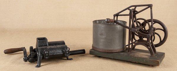 Cast iron food grinder, 19th c., together with a: Cast iron food grinder, 19th c., together with a mechanical chopper, 13'' h.