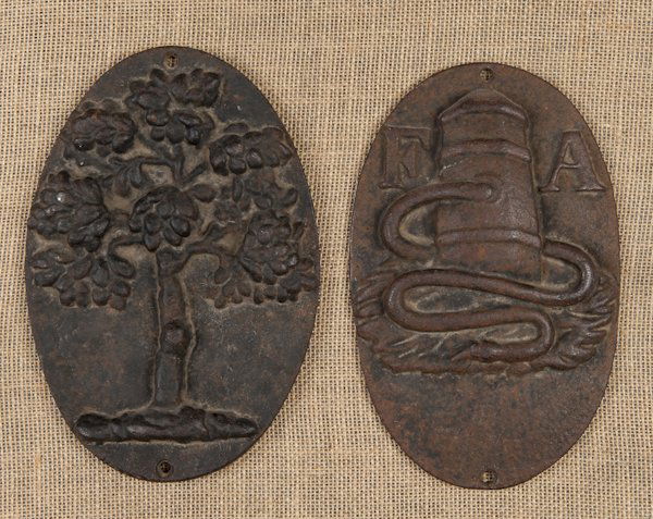 Two cast iron fire marks, 10 3/4'' h.: Two cast iron fire marks, 10 3/4'' h.