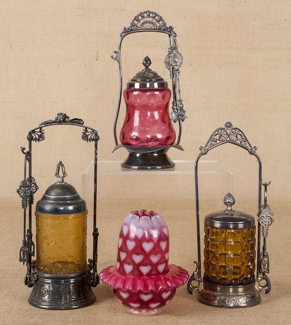 Three Victorian pickle castors, together with a F: Three Victorian pickle castors, together with a Fenton cranberry opalescent bowl and fairy lamp with heart decoration, tallest - 12''.